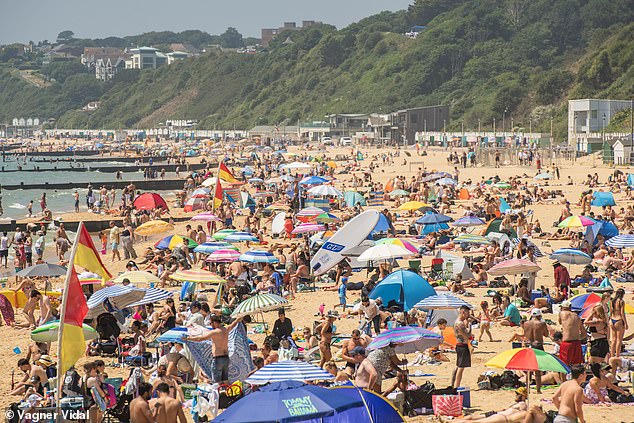 'Severe' risks as 35C UK heatwave could cause hottest day of year today on Bournemouth beach