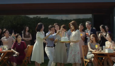 A group of guests at a birthday party during Parasite, one of the best movies on HBO Max.