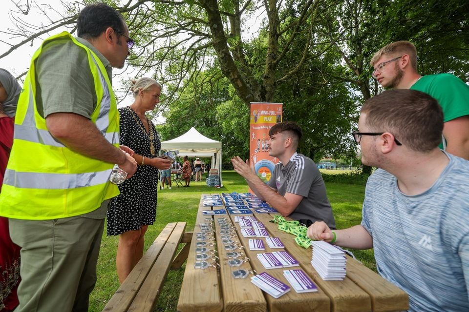 Lord Mayor of Belfast, Councillor Tracy Kelly, meets with families and community groups at the Great Refugee Week Picnic at Ulidia Playing Fields in south Belfast