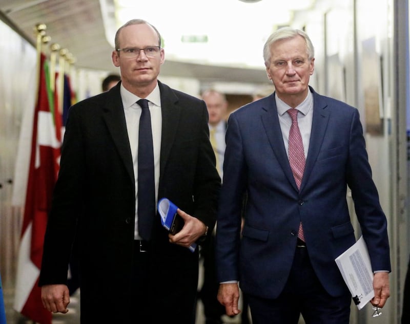 EU chief Brexit negotiator Michel Barnier, right, walks with Tánaiste Simon Coveney prior to a meeting at EU headquarters in Brussels exactly a year ago. Mr Coveney is back in the Belgian capital to attend a meeting of the EU foreign affairs council where discussions on Moldova, China and Yemen are on the agenda 