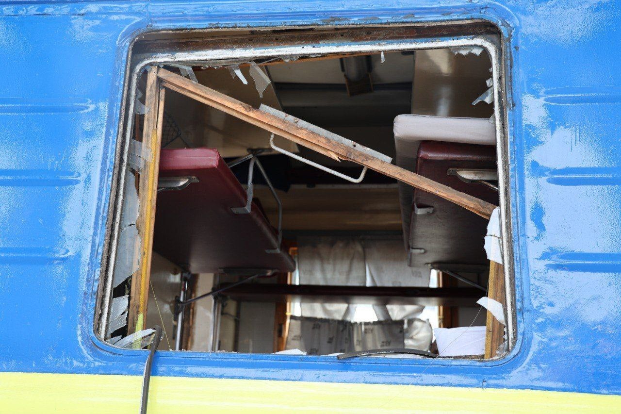 A damaged sleeper train is seen after Russian ballistic missile attacks on Dnipro