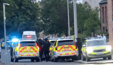 Armed cops swarm Scots street amid ongoing incident as road locked down