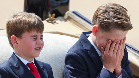 Prince George reacts as he rides a carriage with Prince Louis, Catherine, Princess of Wales, and Princess Charlotte (not pictured) as part of the Trooping the Colour parade which honours Britain's King Charles on his official birthday, in London, Britain, June 14, 2025. REUTERS/Isabel Infantes(REUTERS)