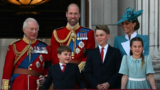 (L to R) Britain's King Charles III, Britain's Prince William, Prince of Wales, Britain's Prince Louis of Wales, Britain's Prince George of Wales, Britain's Catherine, Princess of Wales and Britain's Princess Charlotte of Wales, smile whilst standing on the balcony of Buckingham Palace after attending the King's Birthday Parade "Trooping the Colour" in London on June 14, 2025. The ceremony of Trooping the Colour is believed to have first been performed during the reign of King Charles II. Since 1748, the Trooping of the Colour has marked the official birthday of the British Sovereign. Over 1500 parading soldiers and almost 300 horses take part in the event. (Photo by Ben STANSALL / AFP)(AFP)