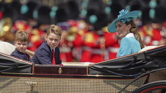 Kate, Princess of Wales with her two sons Prince George, centre and Prince Louis look at the crowds as they ride in a carriage during Trooping the Colour in London, Saturday, June 14, 2025. (AP Photo/Alberto Pezzali)(AP)