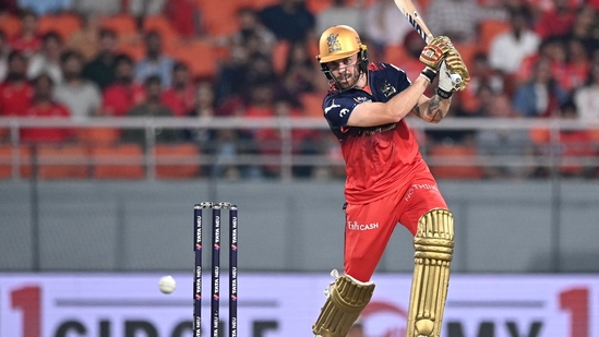 Royal Challengers Bengaluru's Phil Salt plays a shot during the Indian Premier League (IPL) Twenty20 first Qualifier cricket match between Punjab Kings and Royal Challengers Bengaluru at the Maharaja Yadavindra Singh International Cricket Stadium(AFP)