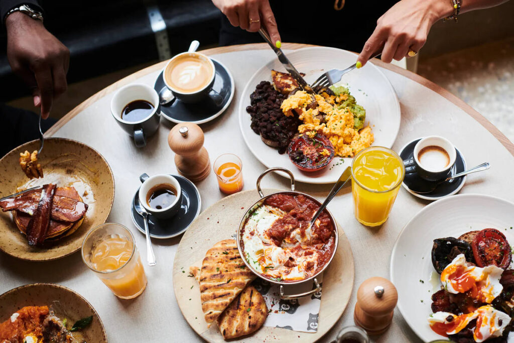 A spread of breakfast food seen on a table