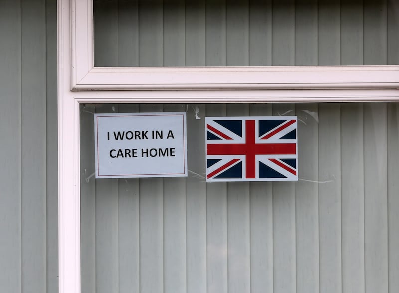 Flags and bunting and other british emblems in the windows of homes in Ballymena following anti-migrant intimidation earlier this month. PICTURE: MAL MCCANN