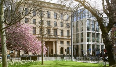 city park and front facade of Edinburgh Grand