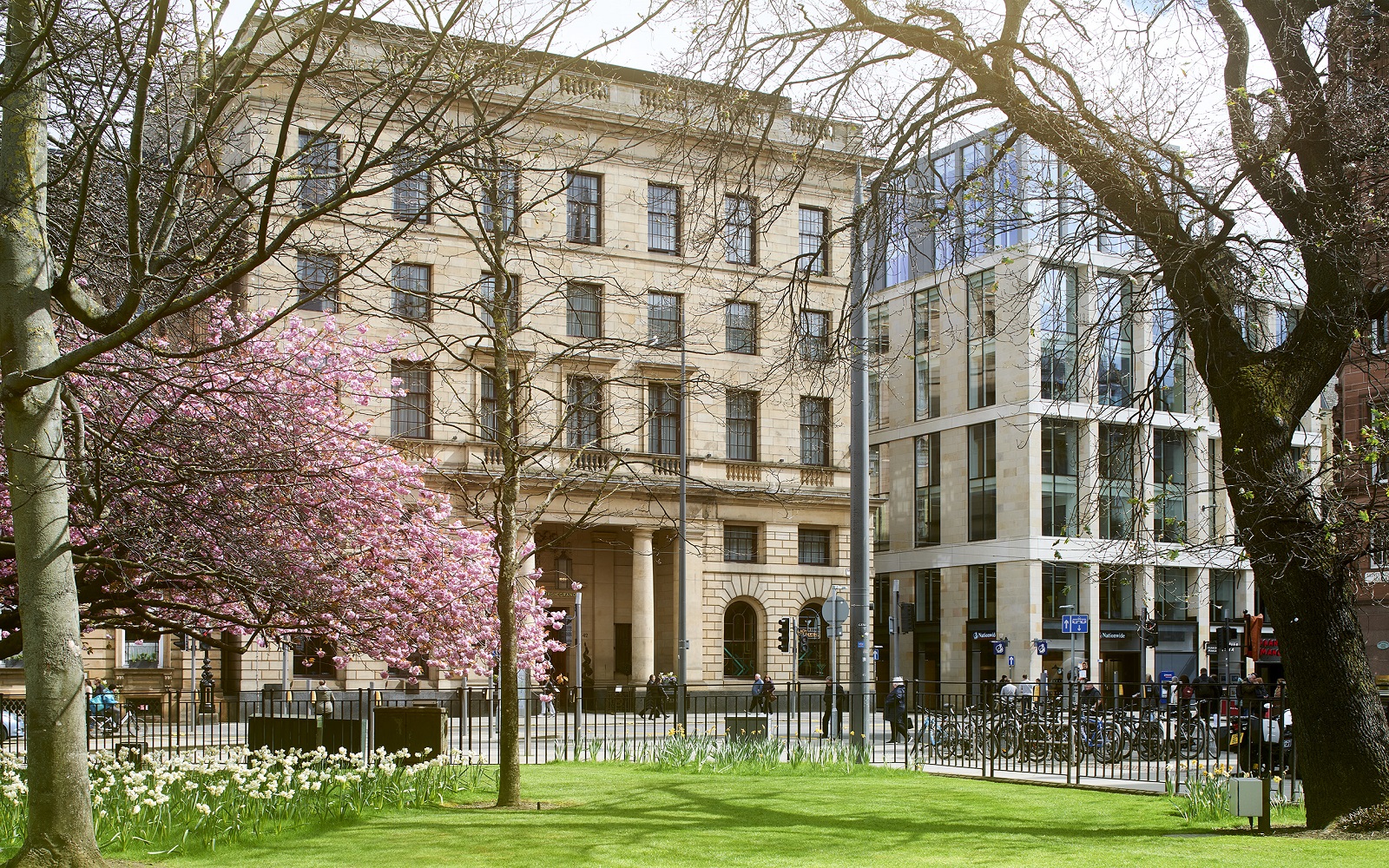 city park and front facade of Edinburgh Grand