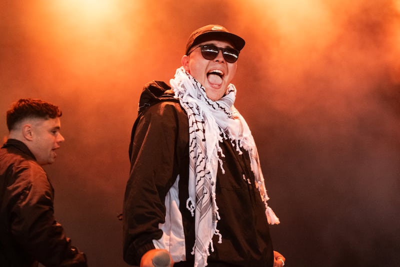 Kneecap's Liam Óg Ó hAnnaidh, who performs under the stage name Mo Chara,  on stage during the NorthSide Festival in Aarhus, Denmark earlier this month. Photograph:  Helle Arensbak/Ritzau Scanpix/AFP via Getty Images       
