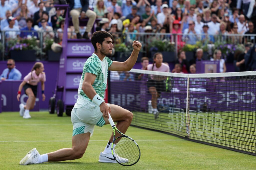 Carlos Alcaraz celebrates a point at Queen's in 2023
