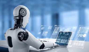 Robot humanoid uses laptop