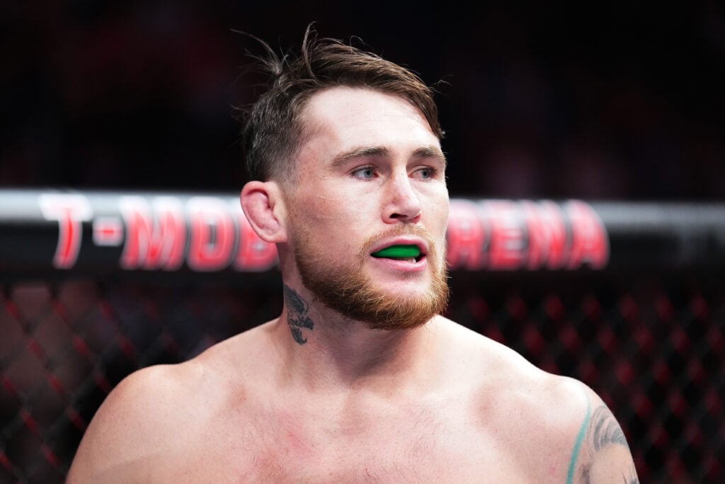 Darren Till stares down UFC 282 opponent Dricus du Plessis as he enters the Octagon