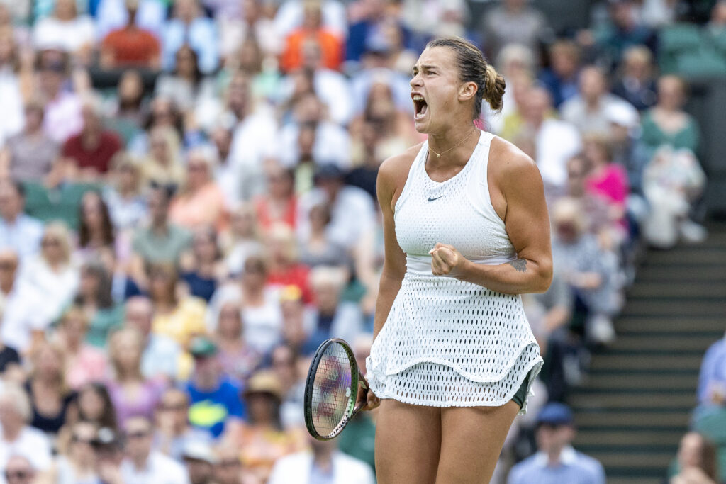 Aryna Sabalenka celebrates during her defeat to Ons Jabeur at Wimbledon in 2023