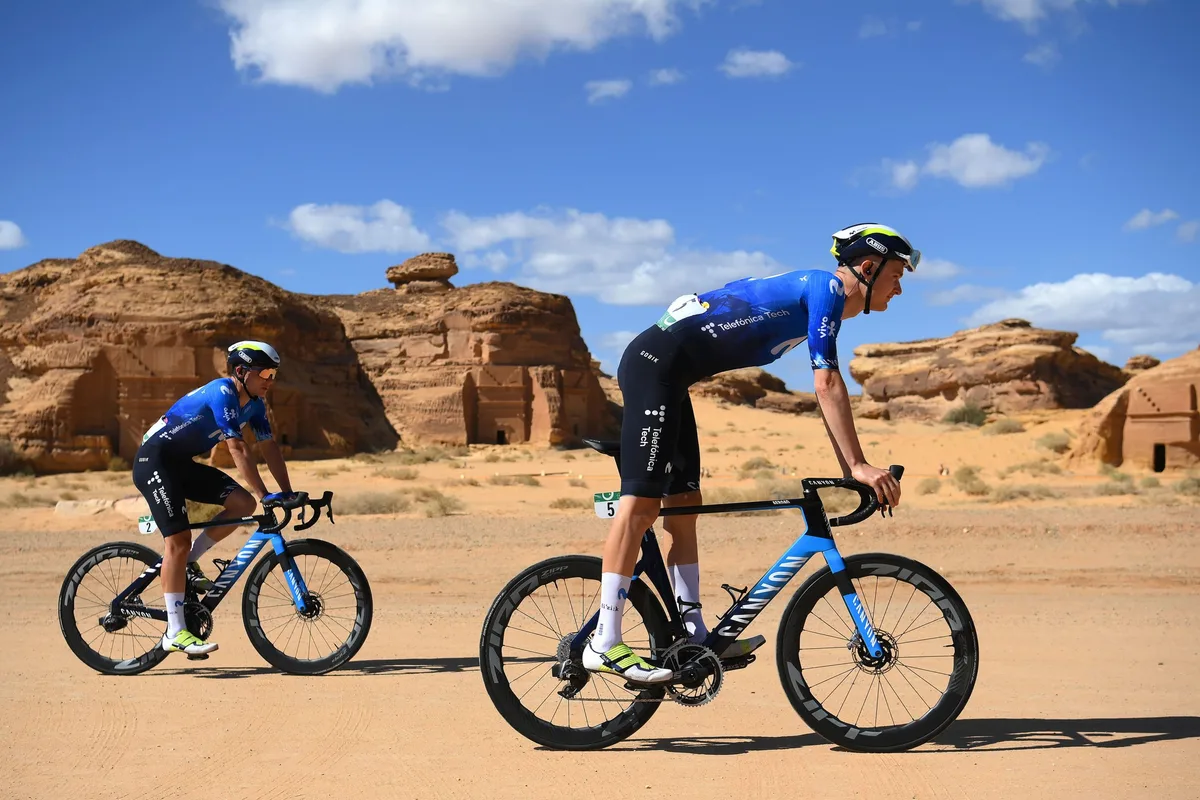 HEGRA, SAUDI ARABIA - FEBRUARY 02: (L-R) Carlos Canal of Spain and Mathias Norsgaard of Denmark and Movistar Team prior to the 4th AlUla Tour 2024, Stage 4 a 142.2km stage from Hegra to Maraya on February 02, 2024 in Hegra, Saudi Arabia. (Photo by Alex Broadway/Getty Images)