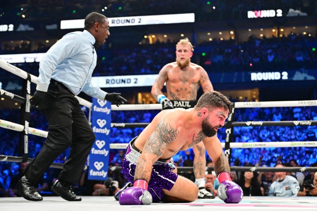 Jake Paul knocks Mike Perry down during boxing fight