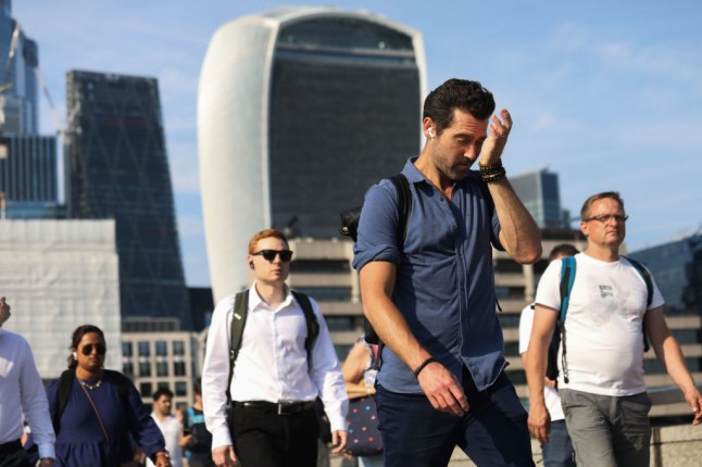 Commuters At London Bridge On The Hottest Day Of The Year