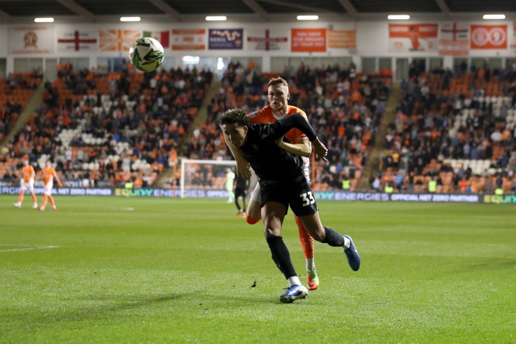 Gabriel Otegbayo shrugs off a challenge from a Blackpool defender during Sheffield Wednesday's Championship fixture at Bloomfield Road