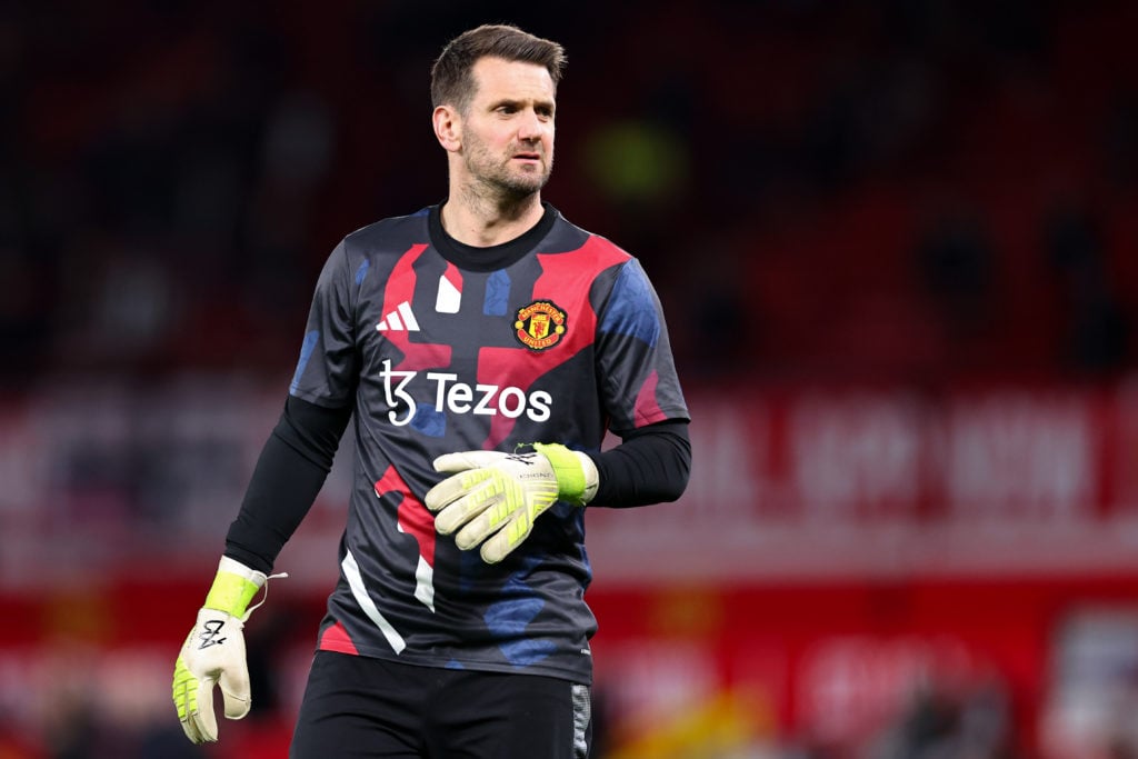 Tom Heaton warming up for Manchester United at Old Trafford.