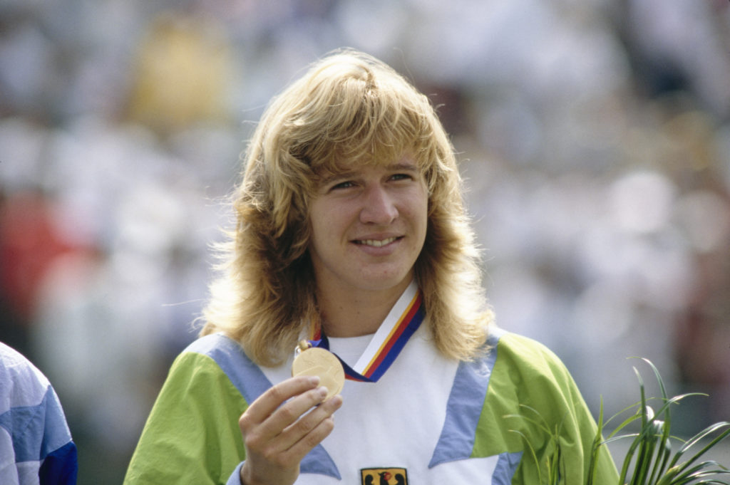 Steffi Graf poses with her Olympic gold medal at the 1988 Olympics