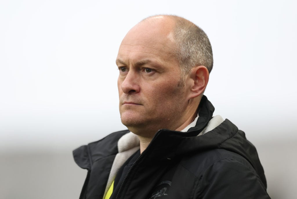 Millwall boss Alex Neil looks on against Queens Park Rangers.