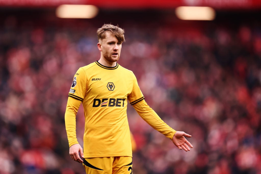 Tommy Doyle playing for Wolves against Liverpool.