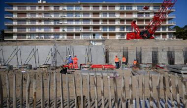 A crew works to construc a sea wall to reduce the risk of coastal flooding and erosion due to sea level rise on March 4 in La Baule, France. Credit: Loic Venance/AFP via Getty Images