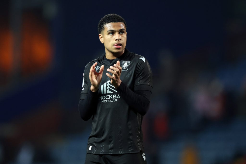 Sheffield Wednesday midfielder Shea Charles claps the fans after a Championship clash vs Blackburn Rovers.