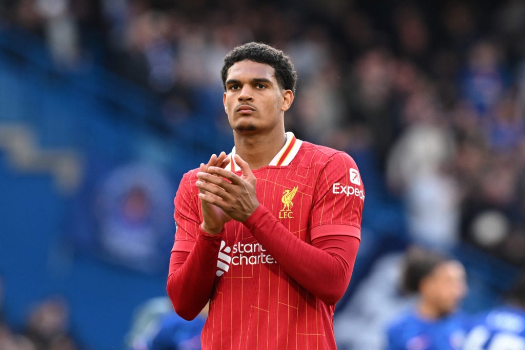 Jarell Quansah of Liverpool applauds the fans following the Premier League match between Chelsea FC and Liverpool FC at Stamford Bridge