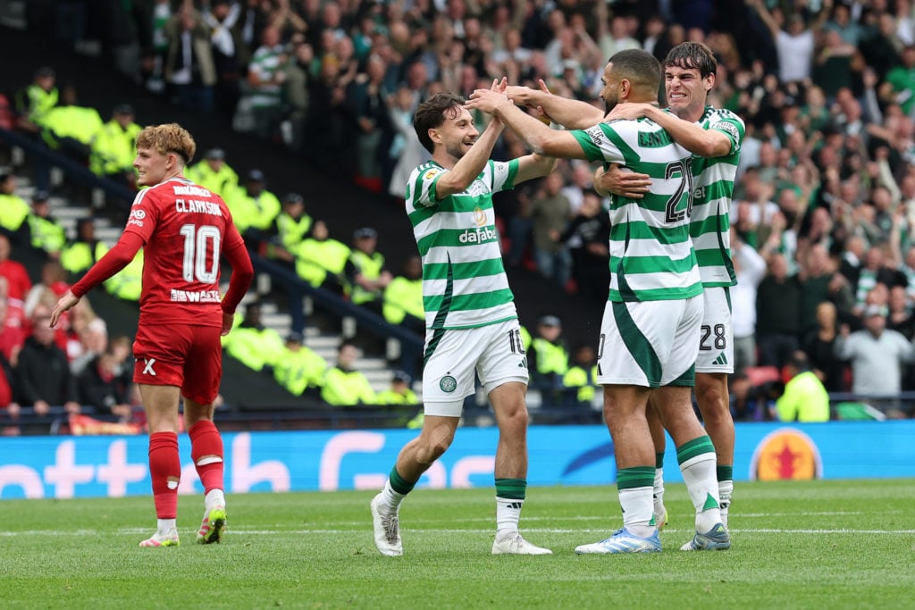 The Celtic players and Cameron Carter-Vickers celebrate against Aberdeen in the Scottish Cup final.