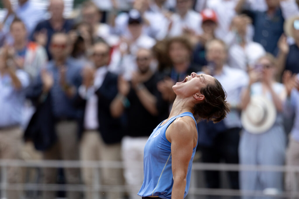 Lois Boisson celebrates her shock win over Jessica Pegula at the 2025 French Open