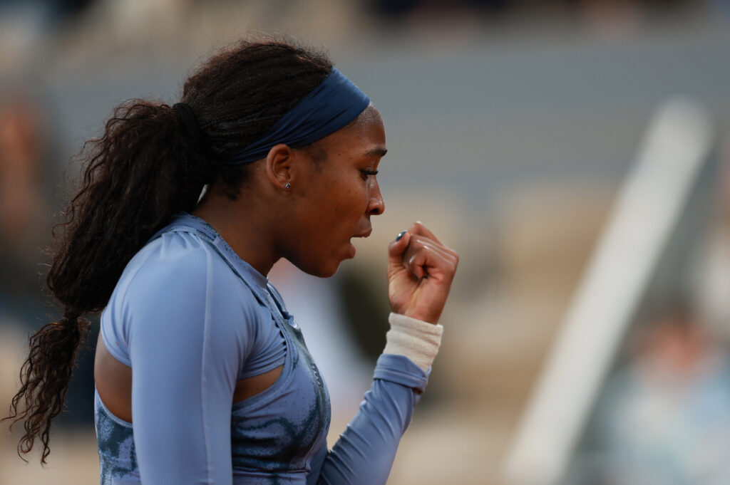 Coco Gauff celebrates winning a point against Madison Keys at the 2025 French Open