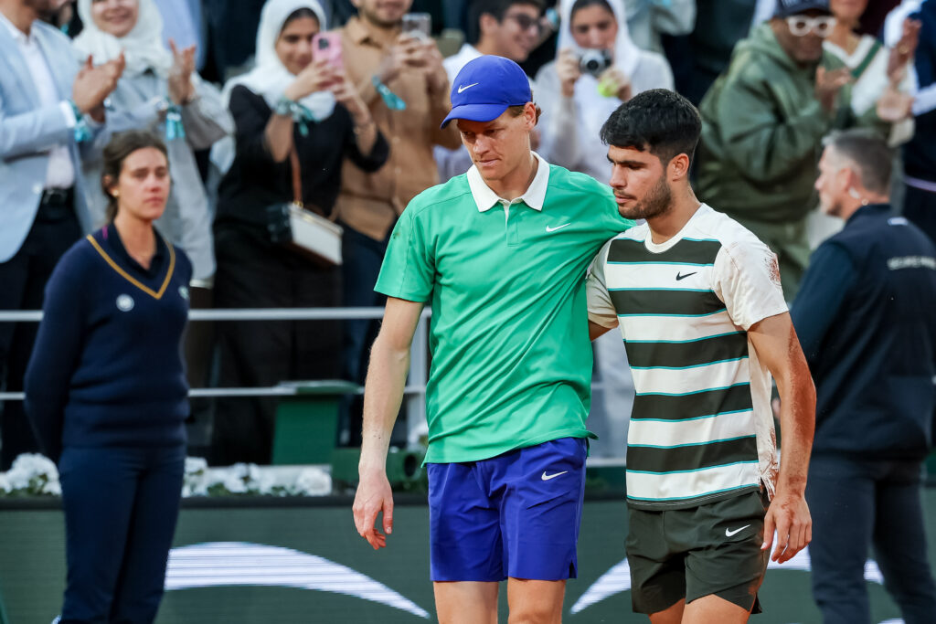 Jannik Sinner and Carlos Alcaraz during Roland Garros 2025 tennis tournament in Paris, France.