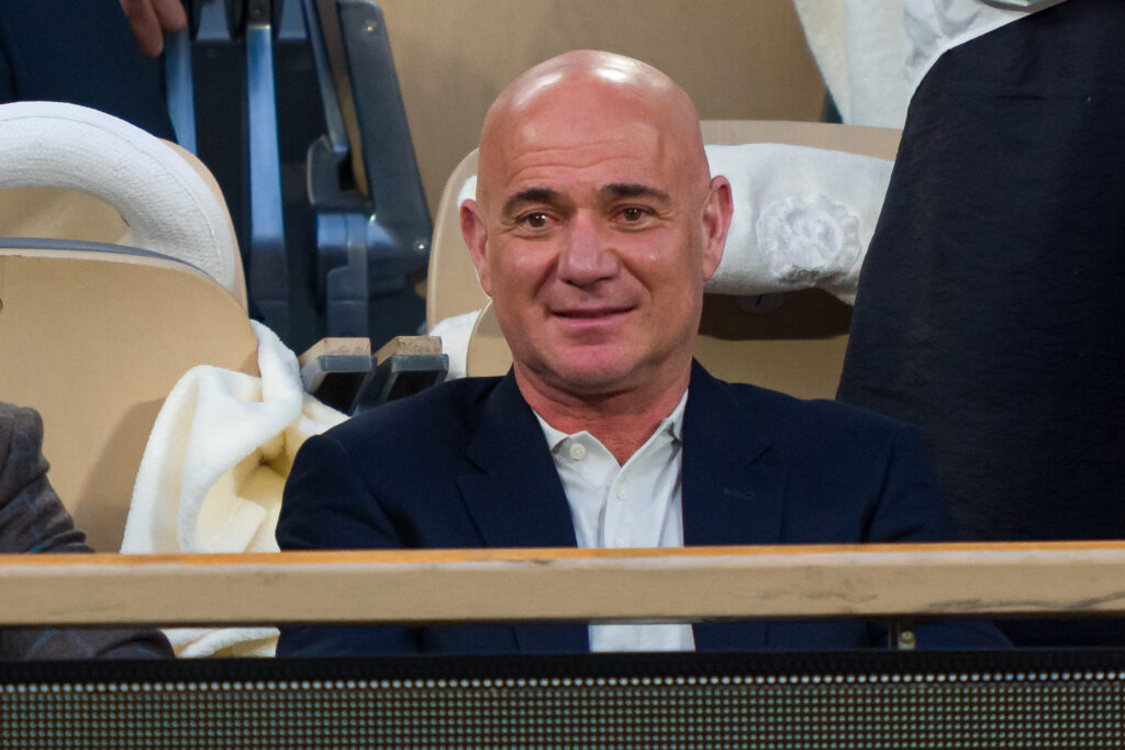 Andre Agassi looks on during the 2025 French Open semi-finals