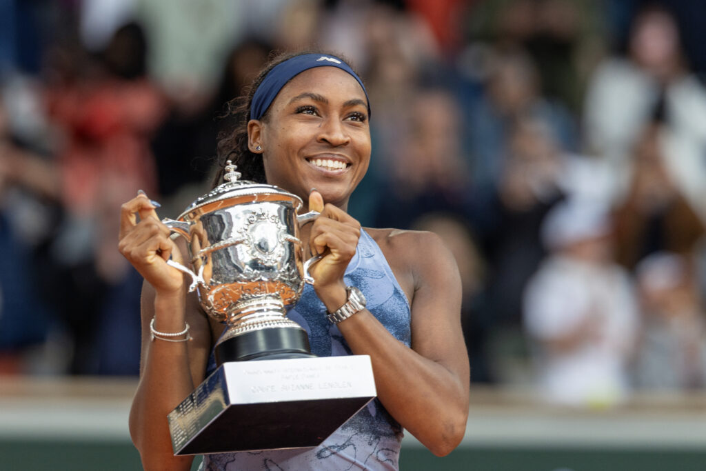 Coco Gauff holding the French Open trophy after beating Aryna Sabalenka in the final