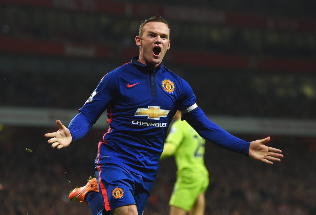 Wayne Rooney taking on Arsenal