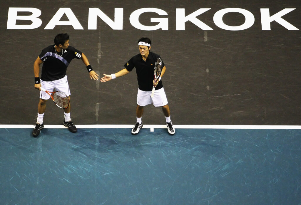 Paradorn Srichaphan and Danai Udomchoke in action at the 2009 Thailand Open