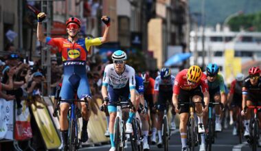Fred Wright of Bahrain Victorious follows Jonathan Milan of Lidl-Trek across finish line into Issoire