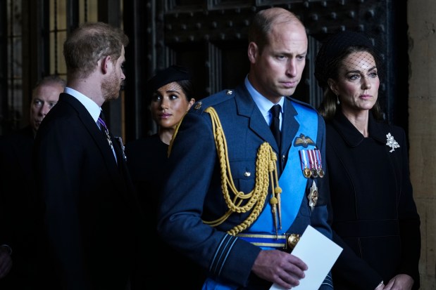 From left, Prince Harry, Meghan Markle, Prince William and Catherine, Princess of Wales, leave after escorting the coffin of Queen Elizabeth II to Westminster Hall from Buckingham Palace for her lying in state on Sept. 14, 2022, in London. (Emilio Morenatti /Getty Images archives)