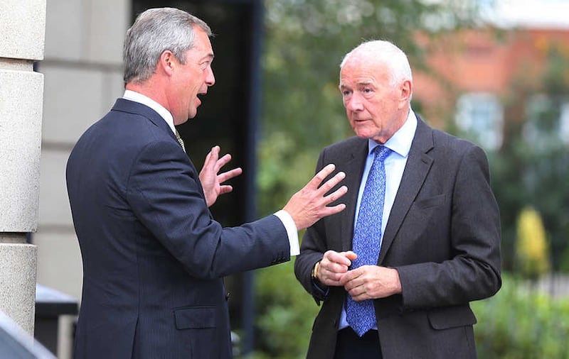David McNarry (right), pictured with Ukip party leader Nigel Farage, has said foreign doctors who receive parking fines should be deported