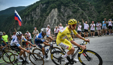 Tadej Pogacar wearing the overall leader's yellow jersey on Stage 19 of the 2024 TDF