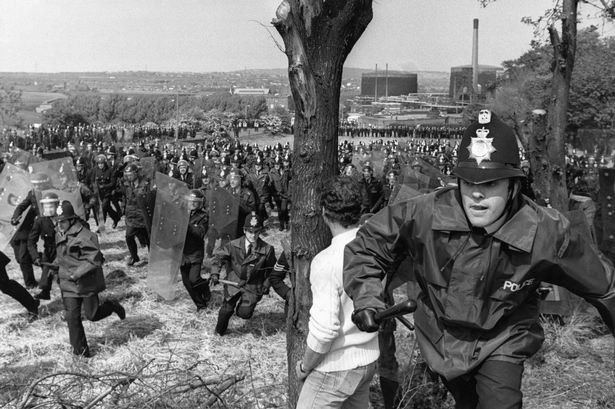 Thousands of striking miners picket outside the Orgreave coke works near Rotherham