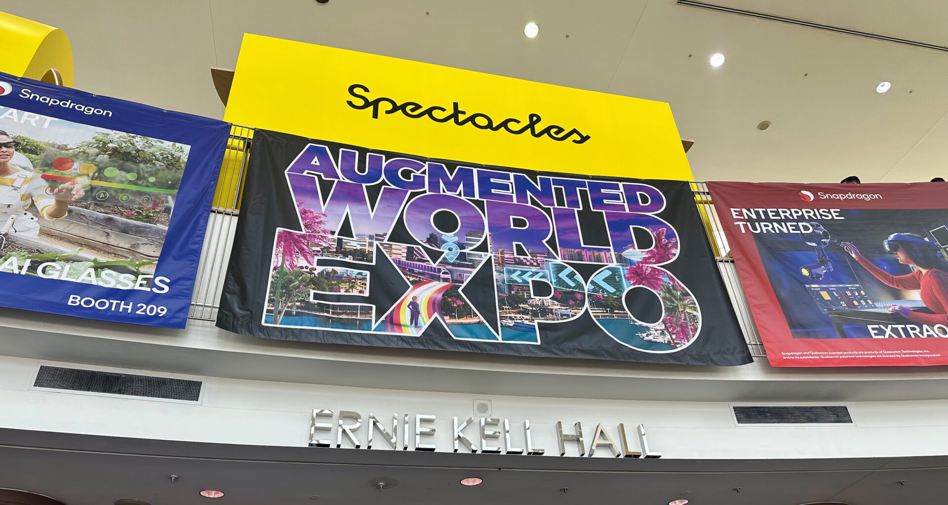 A photo of the Augmented World Expo sign at the entrance of Ernie Kell Hall convention center in Long Beach.