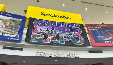 A photo of the Augmented World Expo sign at the entrance of Ernie Kell Hall convention center in Long Beach.