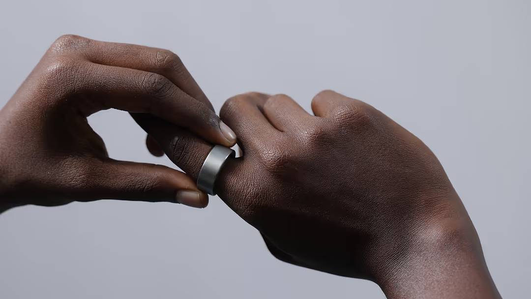 Model trying on the Ultrahuman Ring Air