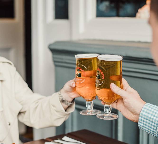 Cheers with a pint of Birra Moretti