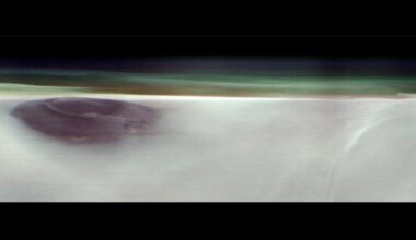 Mars Orbiter Captures Rare View of Ancient Volcano Poking Above the Clouds