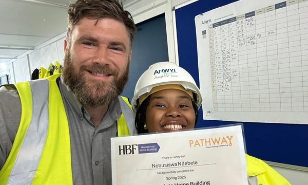Nobu Ndebele with Gareth Foster, Anwyl assistant site manager