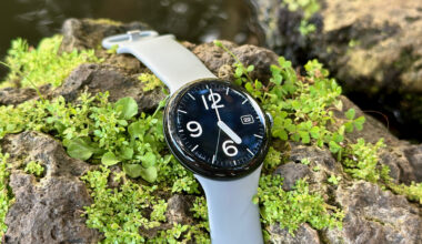 The Google Pixel Watch 3 sitting on a rock with the Pilot Bold watch face